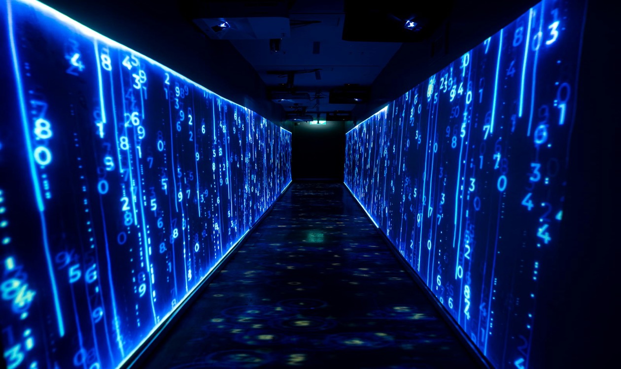 Futuristic blue digital data tunnel representing automated commerce protocols